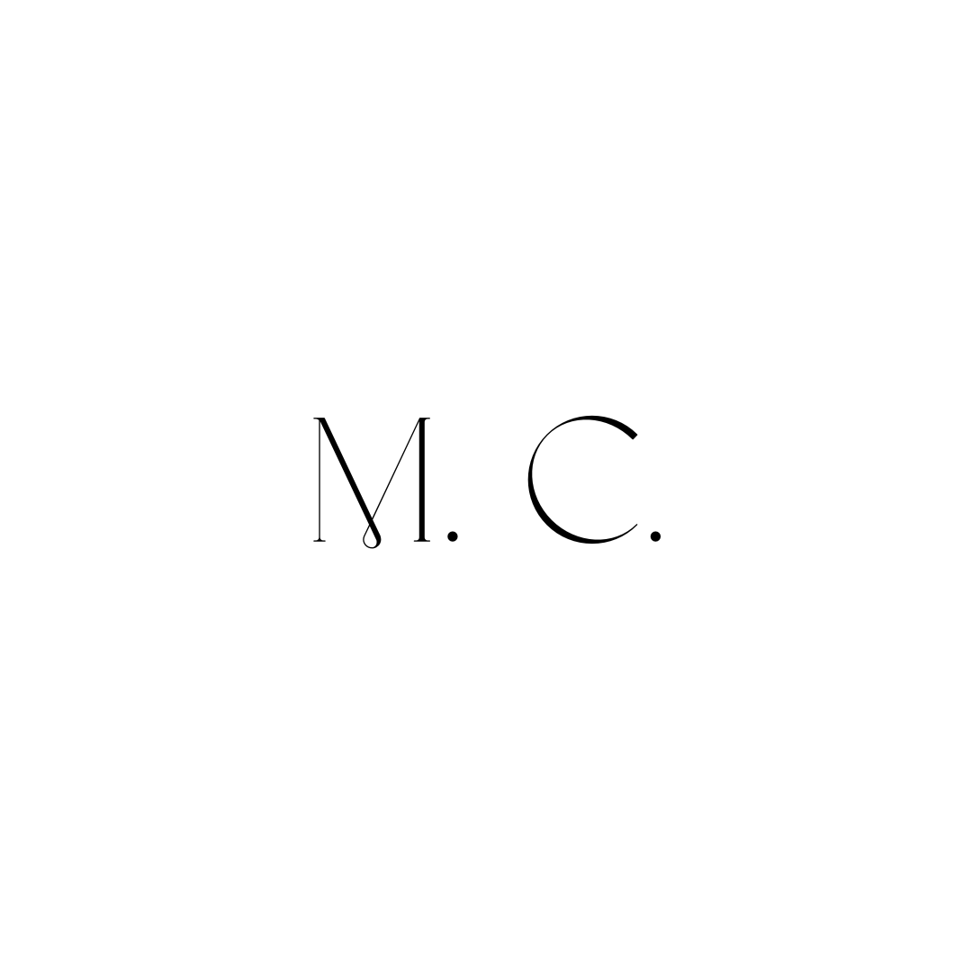 M. C.