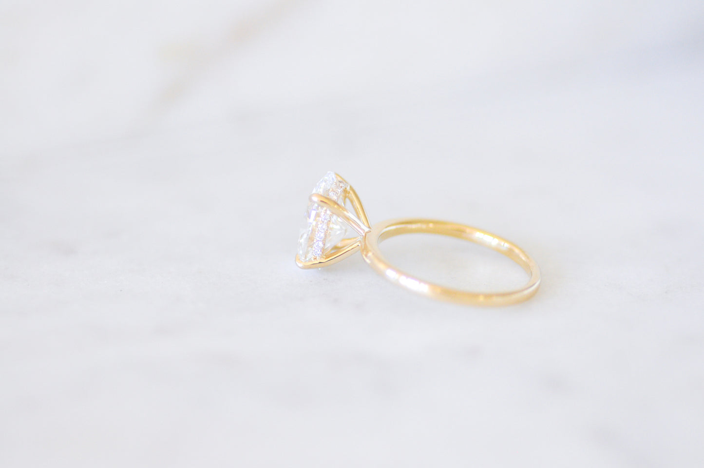 Oval Solitaire with Hidden Halo Engagement Ring