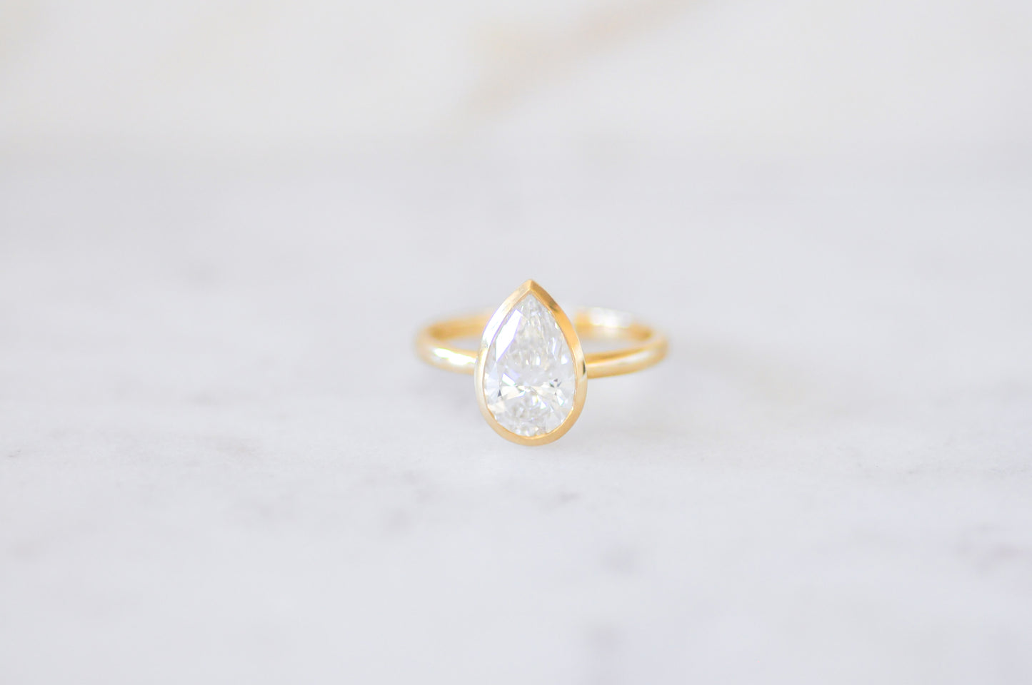 Pear Bezel Solitaire Engagement Ring