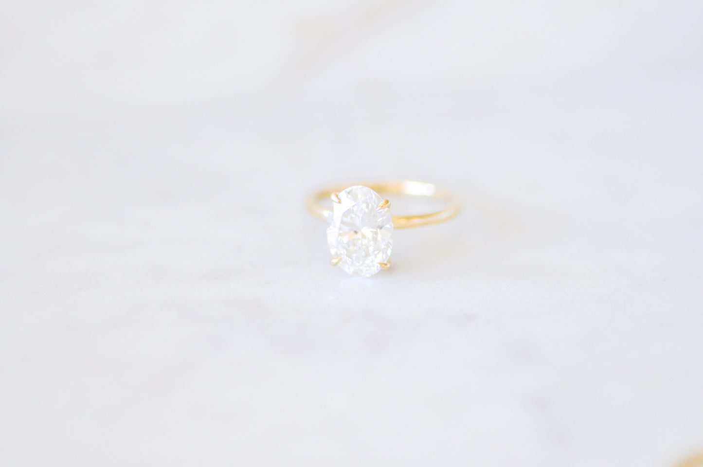 Oval Solitaire with Hidden Halo Engagement Ring