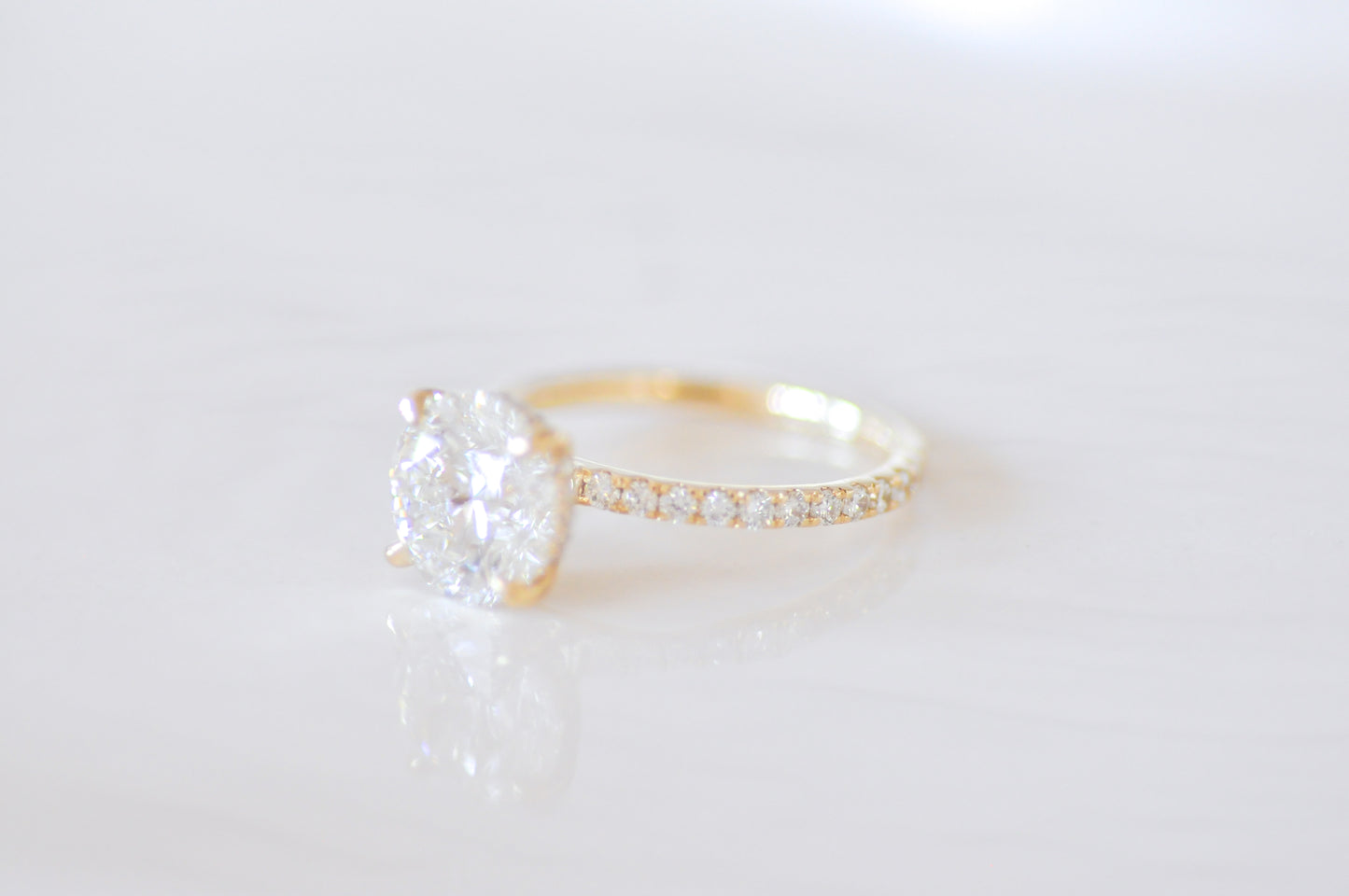 Round Solitaire with Hidden Halo Engagement Ring