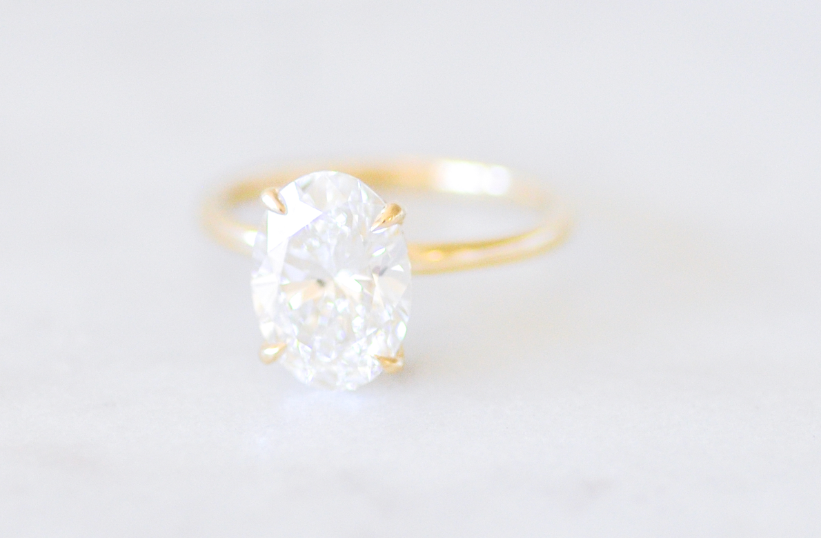 Oval Solitaire with Hidden Halo Engagement Ring